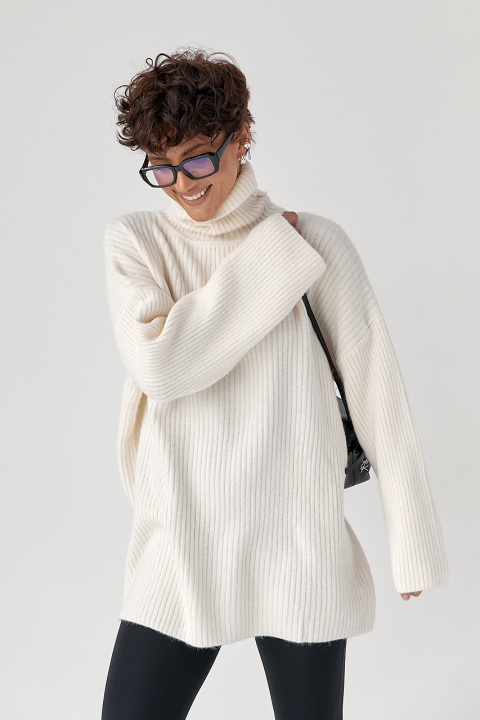 Тепла в'язана туніка в рубчик