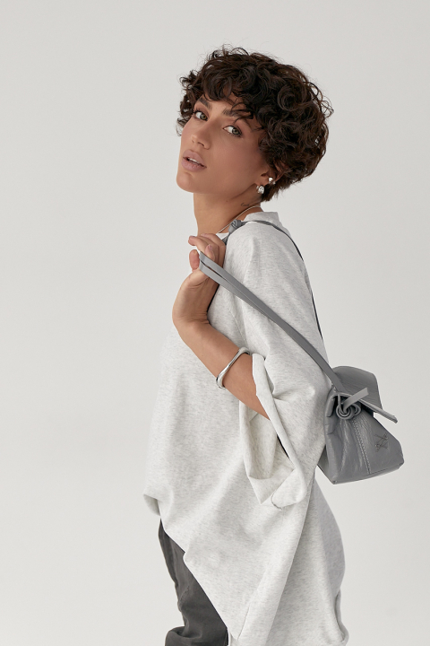 Однотонна вільна футболка з рукавами-реглан