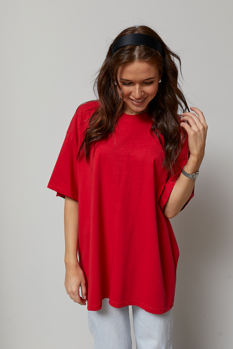 Однотонна футболка вільного фасону з протертими краями